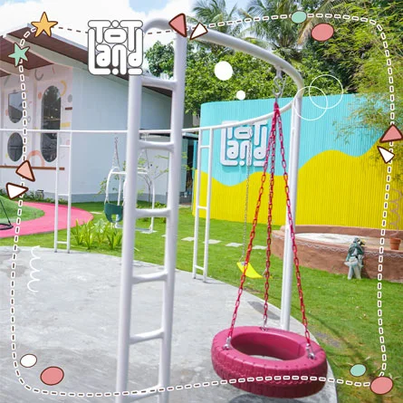 Children playing on outdoor playground equipment at Totland's community center